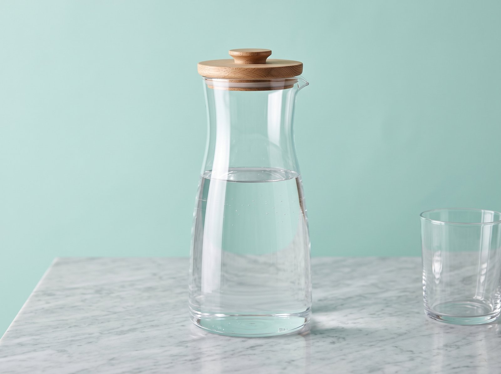 glass water carafe on surface 202608282117